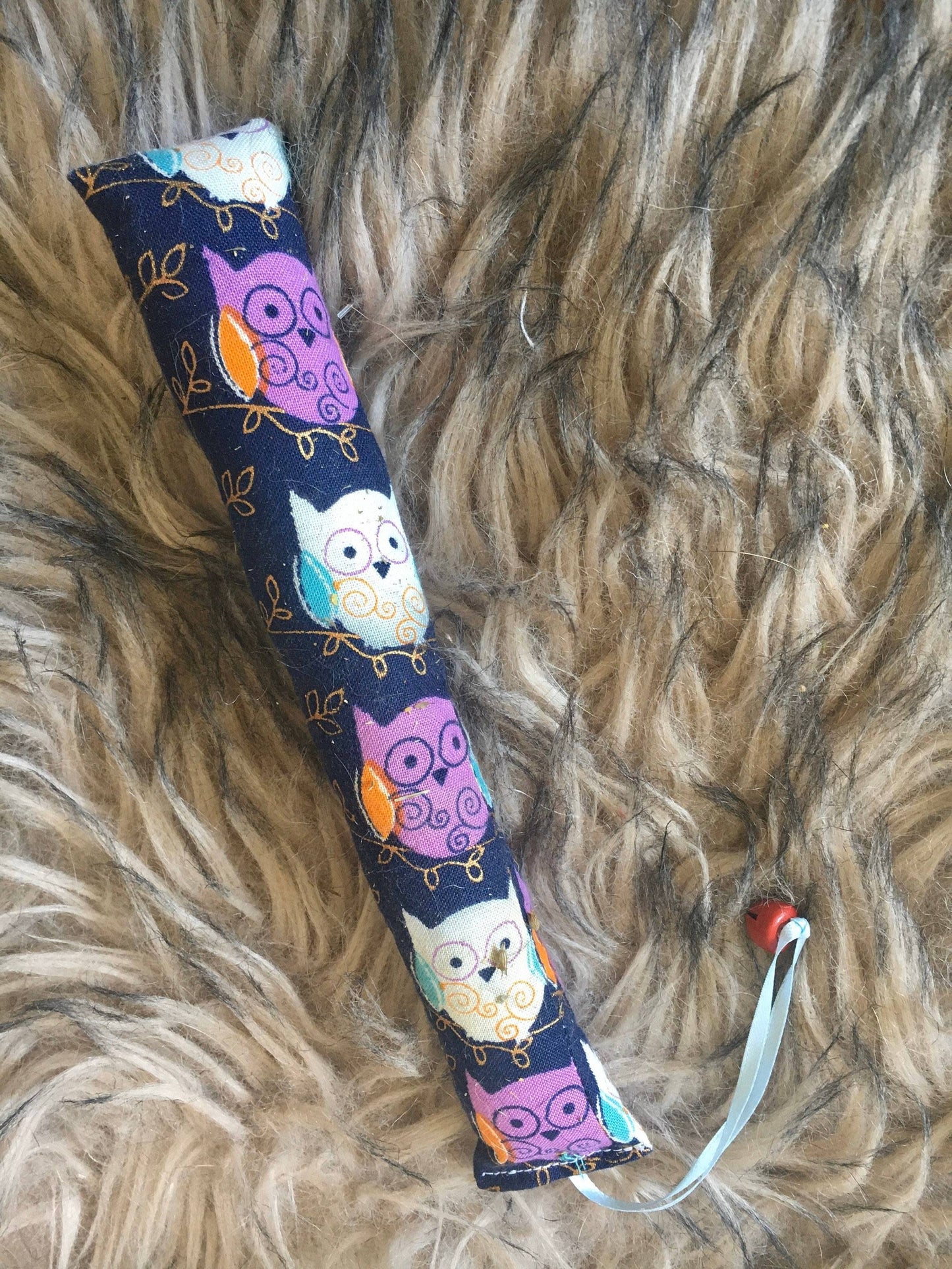 catnip cat kicker toy with owls and bell